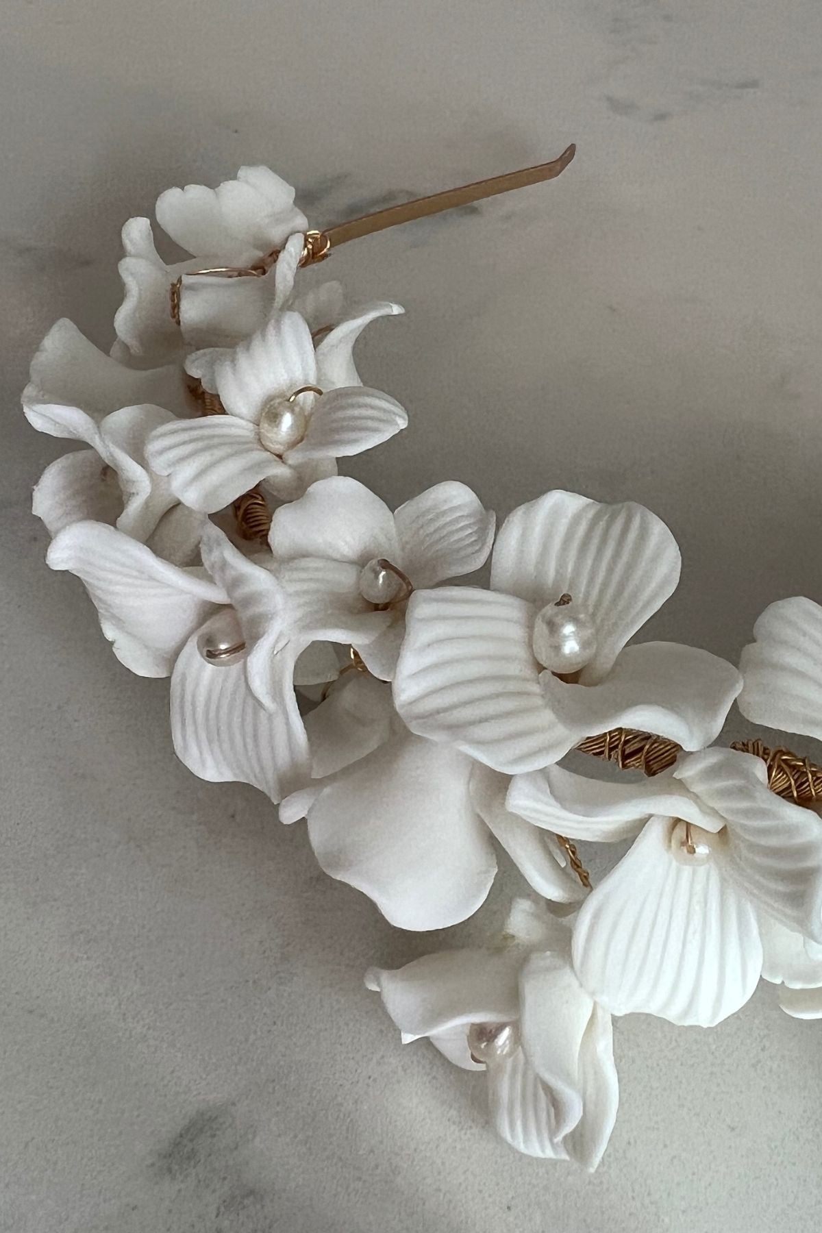 Ceramic floral and pearl bridal headpeice