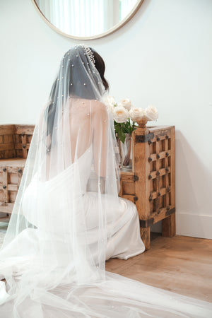 Lightweight pearl veil with pearls cascading in an ombre effect down the veil